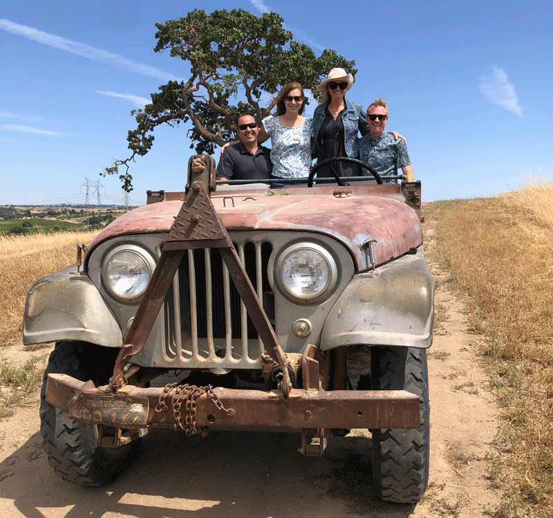 CRASH COURSE tour—Jeep moving through the vineyard.